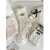 imageOYOANGLE Womens 4 Pairs Polka Dots Bow Print Crew Socks Ruffle Lettuce Trim Ankle Socks Cute Novelty Soft SocksWhite