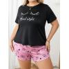 imageOYOANGLE Womens Plus Size 2 Piece Pajama Set Plaid Print Short Sleeve Tee Top and Shorts Set SleepwearBlack and Pink
