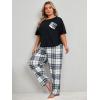 imageOYOANGLE Womens Plus Size 2 Piece Pajama Set Short Sleeve Tee Shirt and Plaid Print Pants Set LoungewearBlack and White