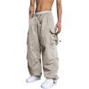 imageOYOANGLE Mens Cargo Pants Elastic Waist Flap Pockets Hip Hop Baggy Harem PantsBeige Solid