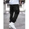 imageOYOANGLE Mens Casual Drawstring Elastic Waist Flap Pocket Letter Graphic Street Jogger Cargo PantsPlain Black