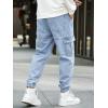 imageOYOANGLE Mens Drawstring Waist Flap Pocket Jogger Cargo Pants Carrot Denim Jeans with PocketLight Wash