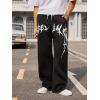 imageOYOANGLE Mens Graphic Print Drawstring Waist Baggy Sweatpants Loose Straight Leg Pants with PocketBlack