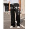 imageOYOANGLE Mens Graphic Print Drawstring Waist Baggy Sweatpants Loose Straight Leg Pants with PocketBlack