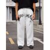 imageOYOANGLE Mens Graphic Print Drawstring Waist Baggy Sweatpants Loose Straight Leg Pants with PocketWhite