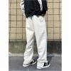 imageOYOANGLE Mens Letter Patch Side Split Drawstring Waist Sweatpants Textured Pockets Straight Leg PantsBeige