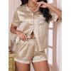 imageOYOANGLE Womens 2 Piece Leopard Satin Pajama Set Button Down Shirt and Shorts Pjs SleepwearGold