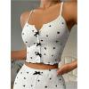 imageOYOANGLE Womens Heart Print Ribbed Knit Cami Pajama Tops Bowknot Criss Cross Camisole Crop Tops NightwearBlack and White