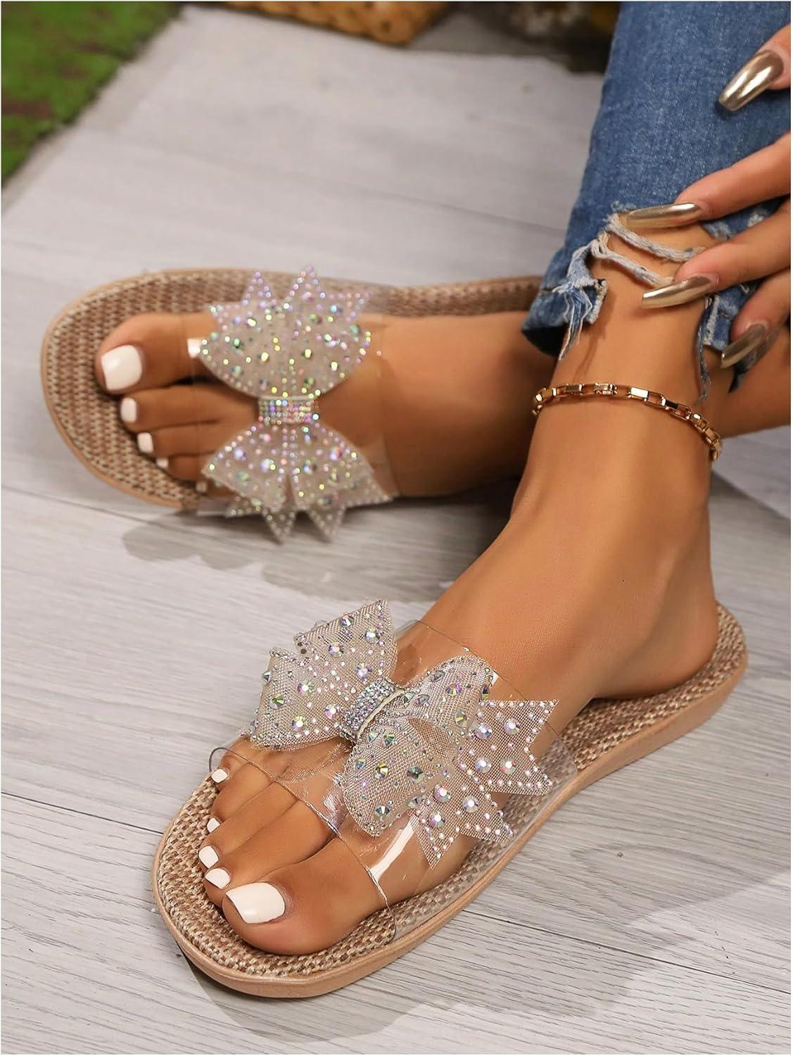 imageOYOANGLE Womens Rhinestone Sparkly Bow Slide Sandals Open Toe Clear Flat Sandal Dressy Casual SlippersClear