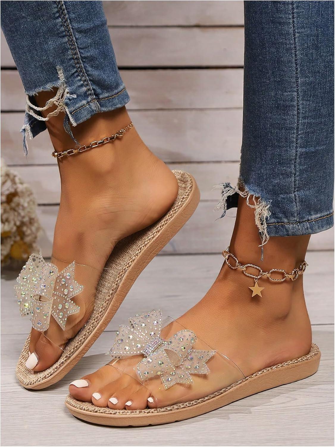 imageOYOANGLE Womens Rhinestone Sparkly Bow Slide Sandals Open Toe Clear Flat Sandal Dressy Casual SlippersClear