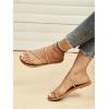 imageOYOANGLE Womens Metallic Cross Strap Toe Ring Sandals Open Toe Slip on Flat SandalGold