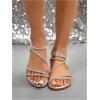 imageOYOANGLE Womens Strappy Sandals Rhinestone Sparkly Criss Cross Comfortable Elastic Ankle Strap SandalWhite