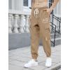 imageOYOANGLE Mens Cargo Pants Drawstring Elastic Waist Flap Pocket Casual Street PantsKhaki Graphic